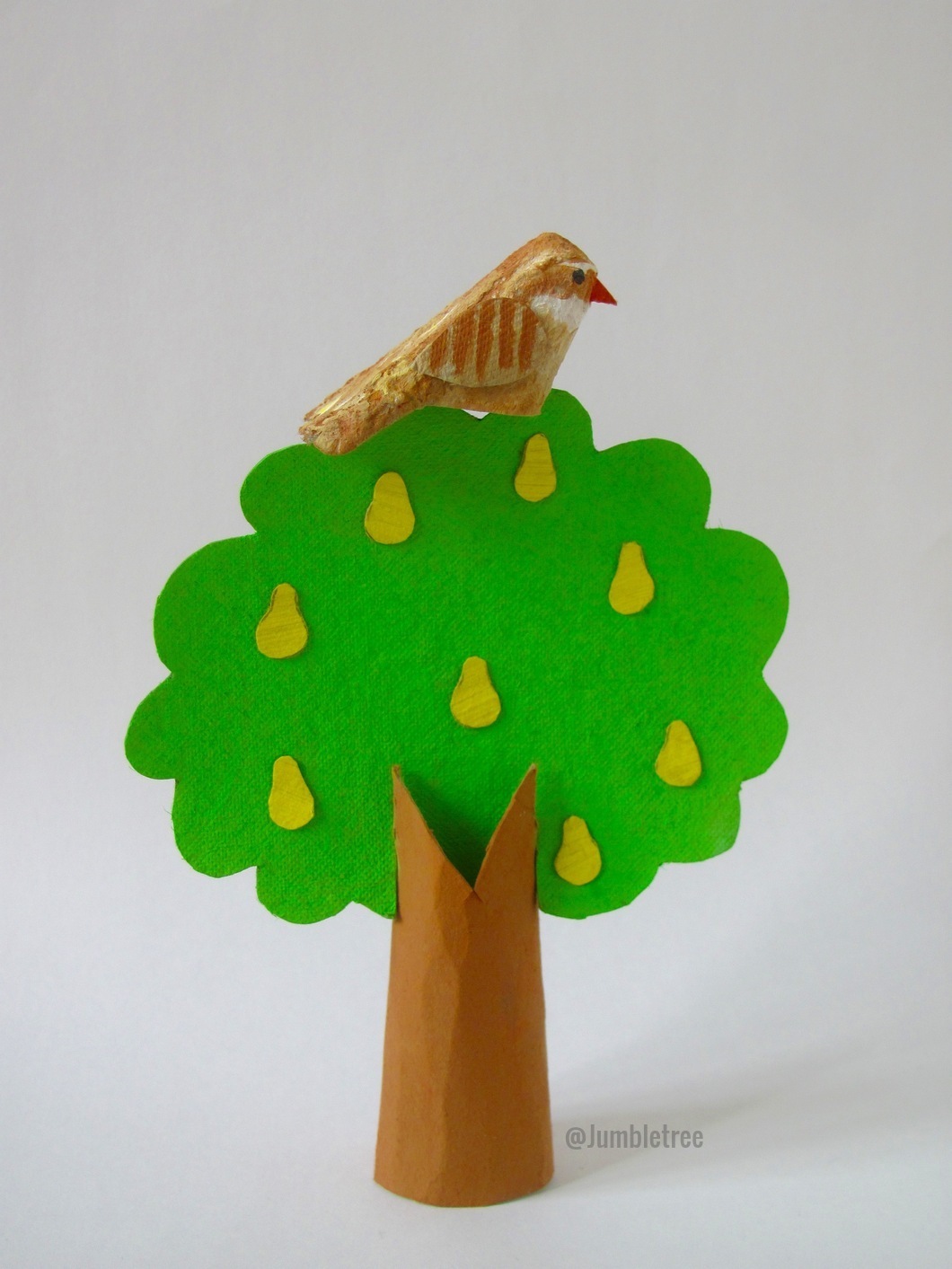 Craft of a bird in a tree made of paper